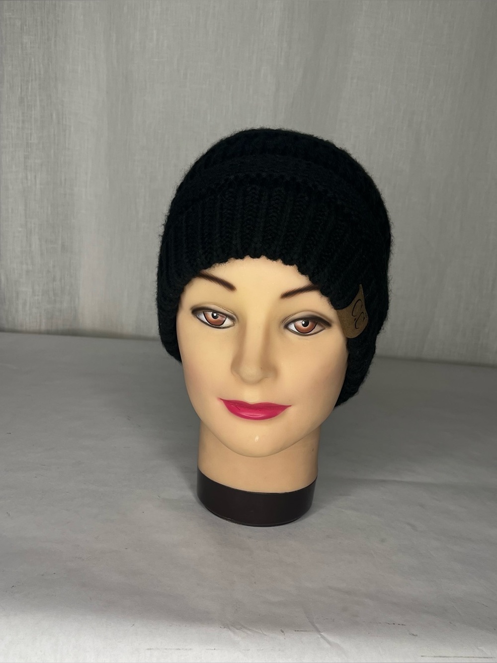 Navy beanie with a bit of rainbow!